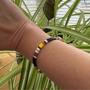 Wildflower Black and multi-coloured beaded bracelet with adjustable string